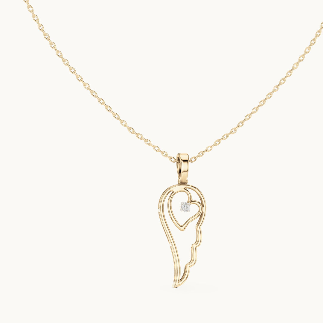 Round lab-grown diamond angel wing heart pendant in yellow gold, 0.045 CT TW, view 1