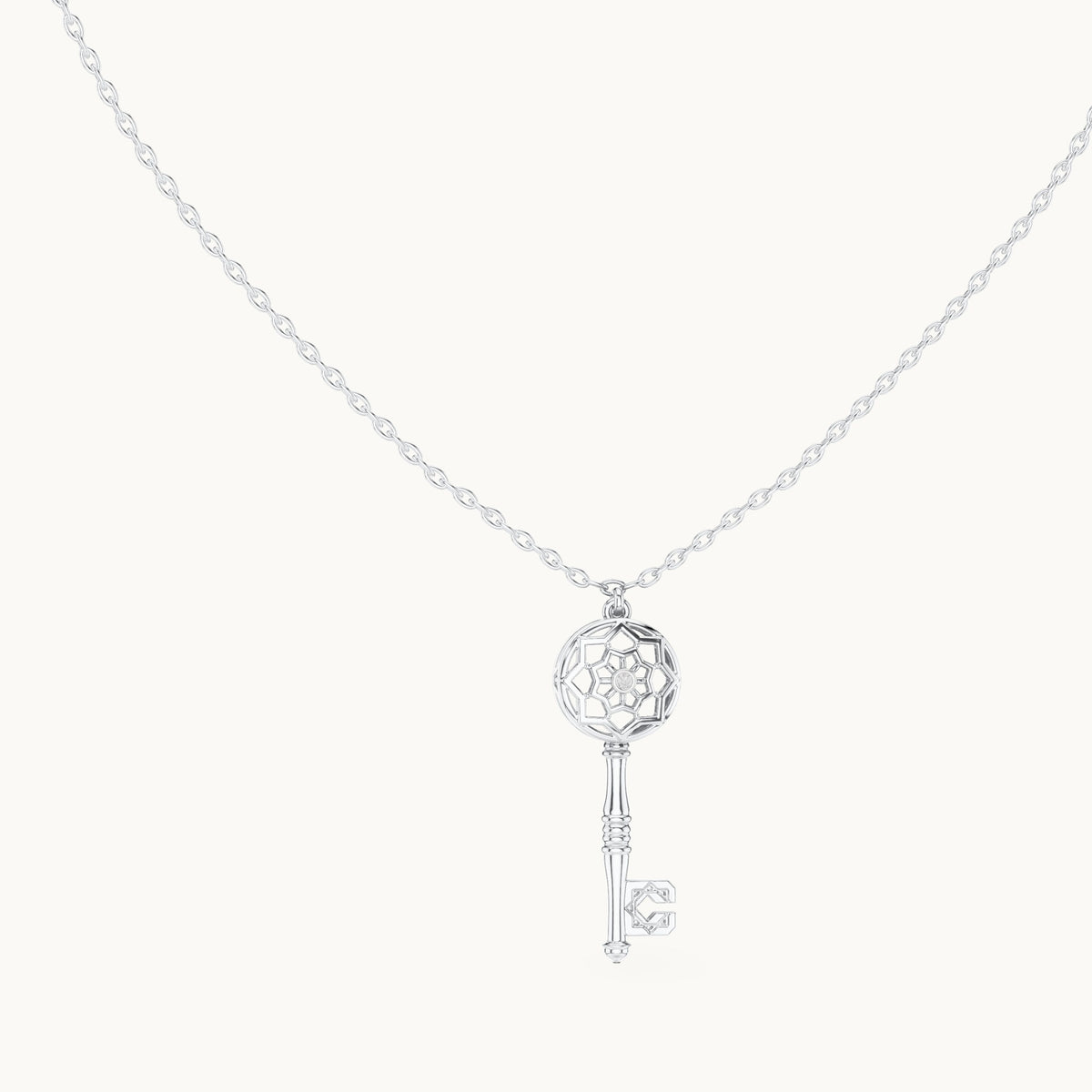 Round lab-grown diamond filigree key pendant in white gold, 0.008 CT TW, view 1