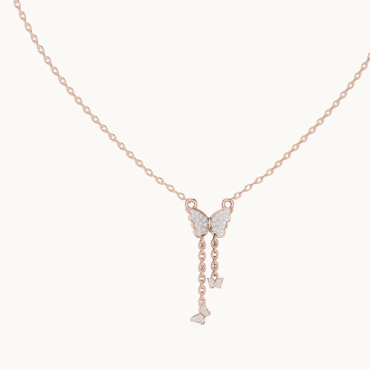 Round lab-grown diamond butterfly drop pendant in rose gold, 0.12 CT TW, view 1