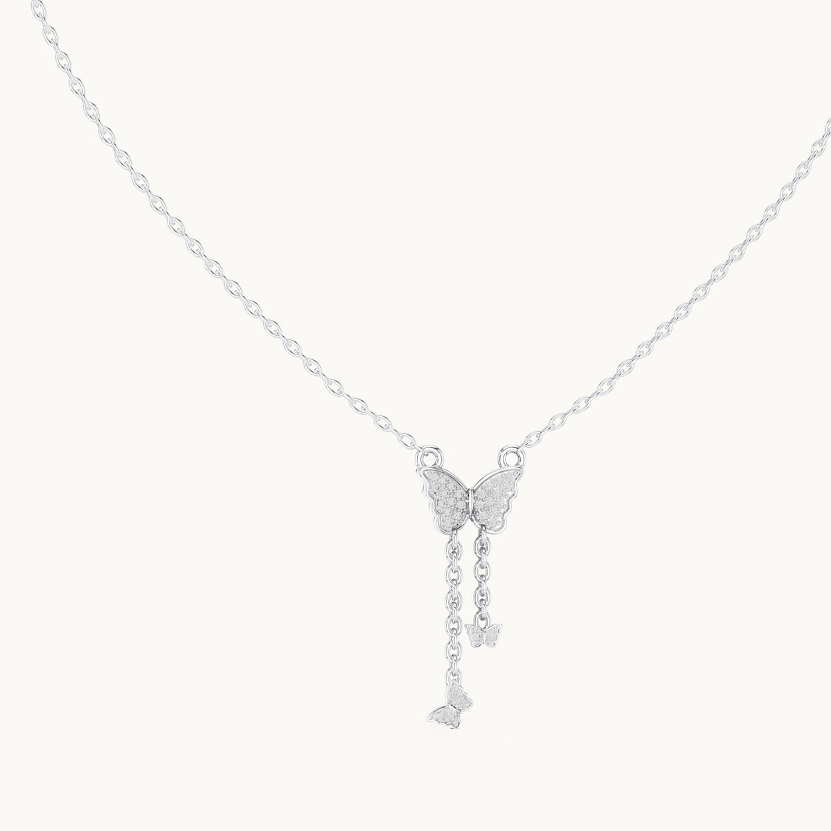 Round lab-grown diamond butterfly drop pendant in white gold, 0.12 CT TW, view 1