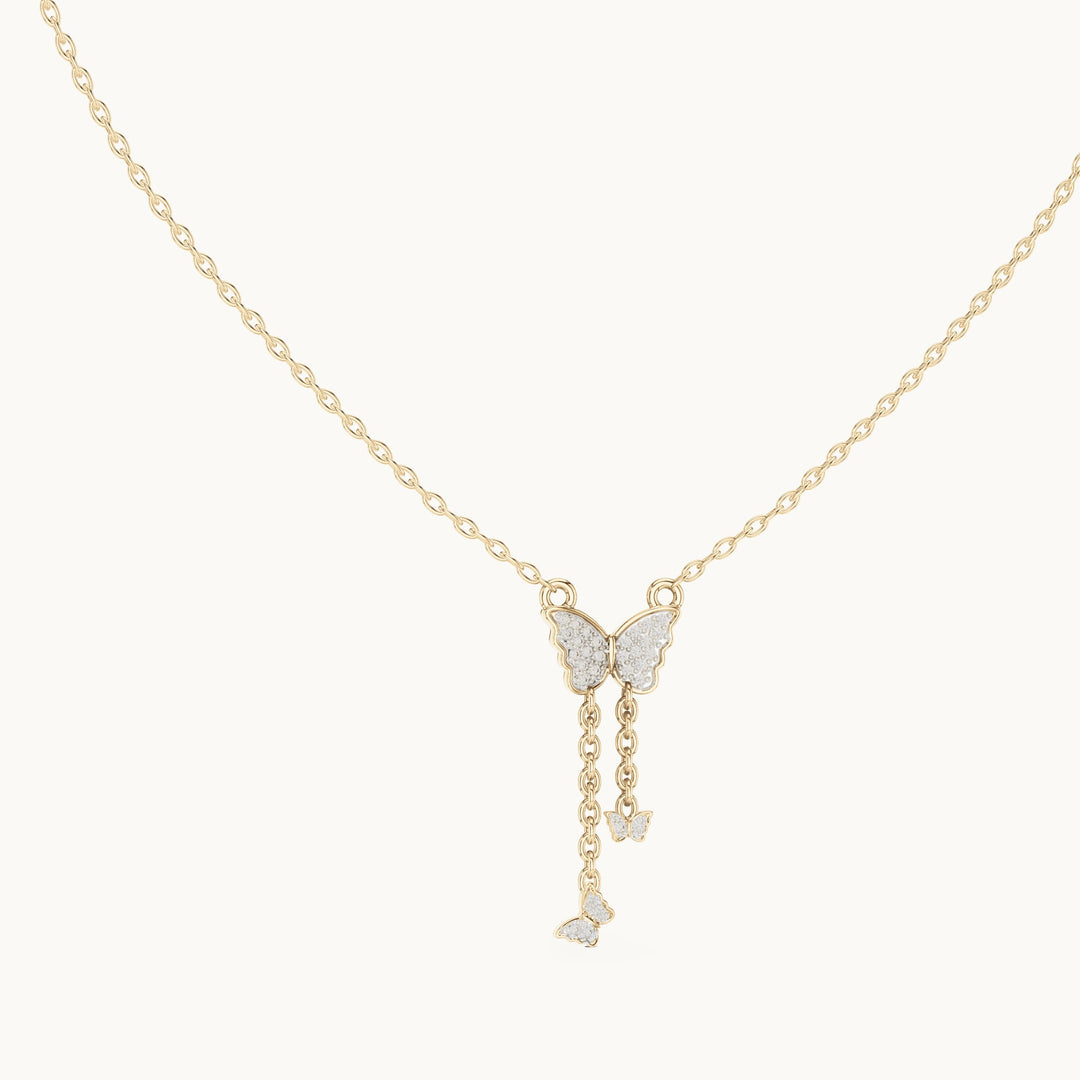 Round lab-grown diamond butterfly drop pendant in yellow gold, 0.12 CT TW, view 1
