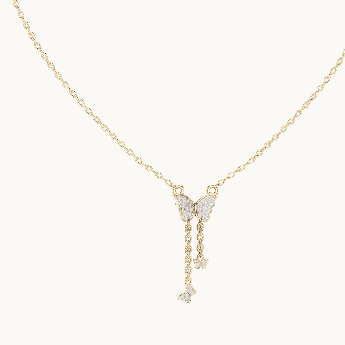 Round lab-grown diamond butterfly drop pendant in yellow gold, 0.12 CT TW, view 1