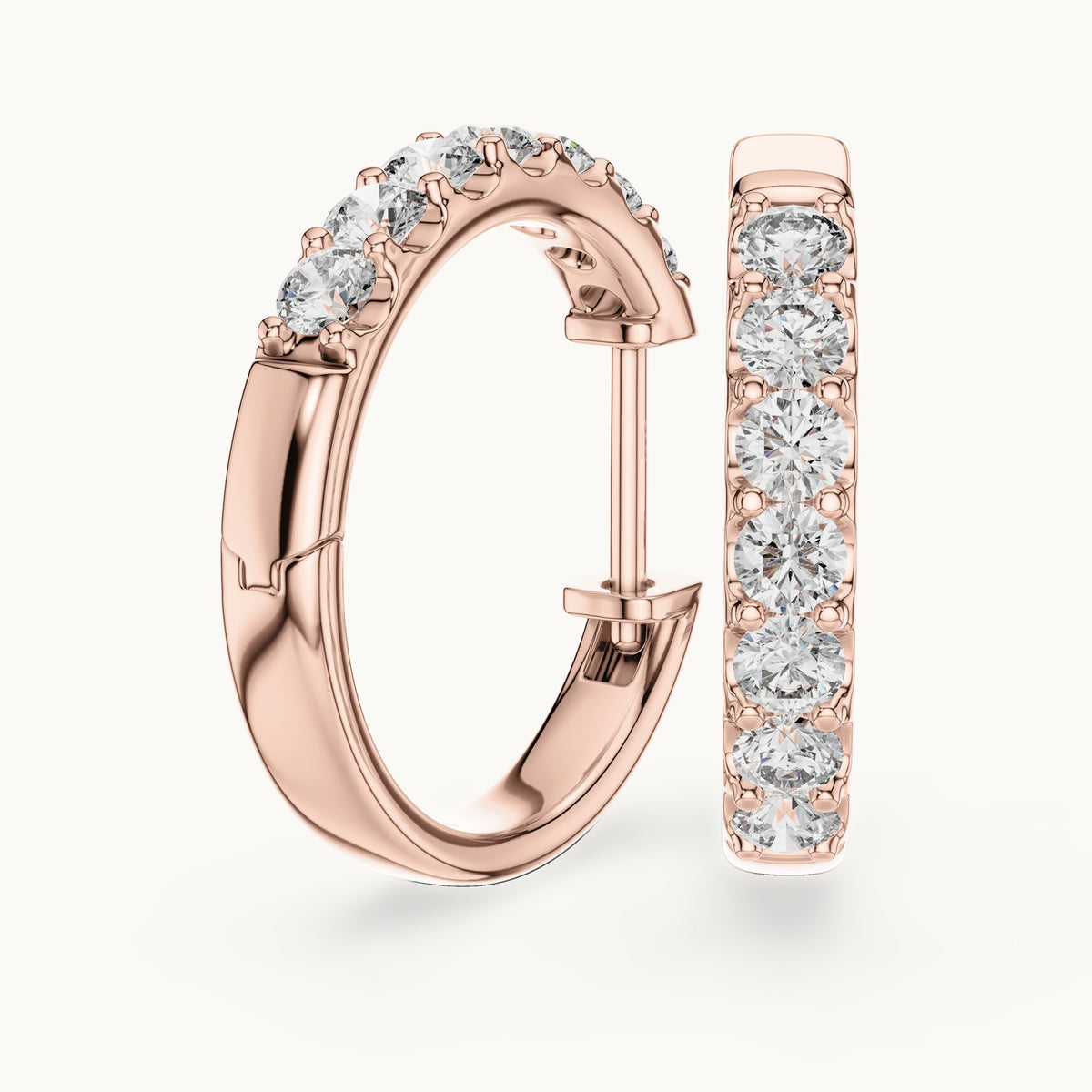 Round lab-grown diamond graduated hoop earrings in rose gold, 0.70 CT TW, view 1