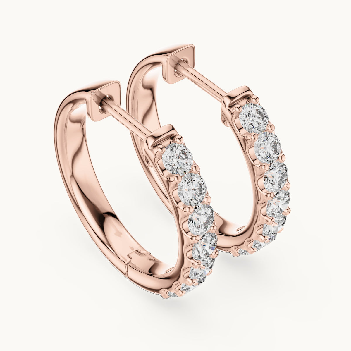 Round lab-grown diamond graduated hoop earrings in rose gold, 0.70 CT TW, view 2