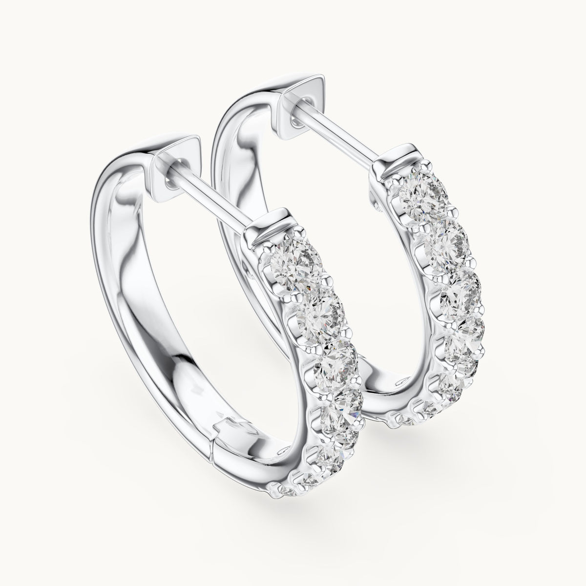 Round lab-grown diamond graduated hoop earrings in white gold, 0.70 CT TW, view 2