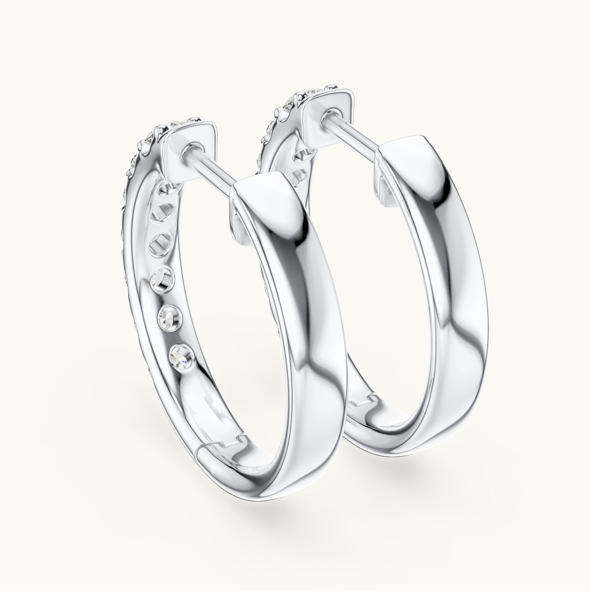Round lab-grown diamond graduated hoop earrings in white gold, 0.70 CT TW, view 3