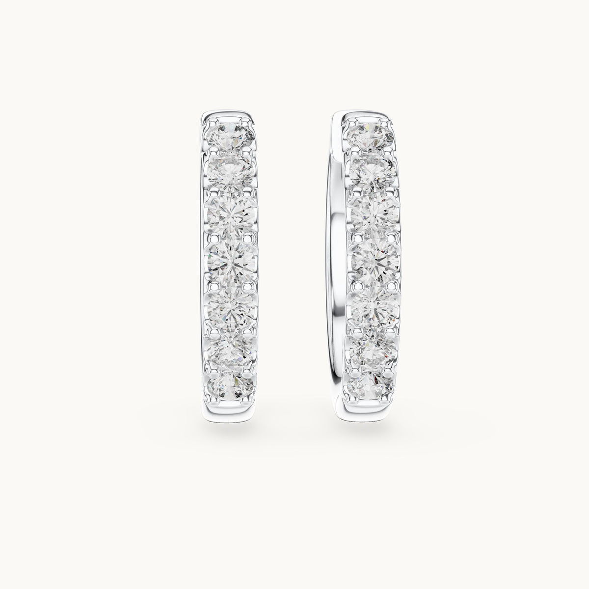 Round lab-grown diamond graduated hoop earrings in white gold, 0.70 CT TW, view 4