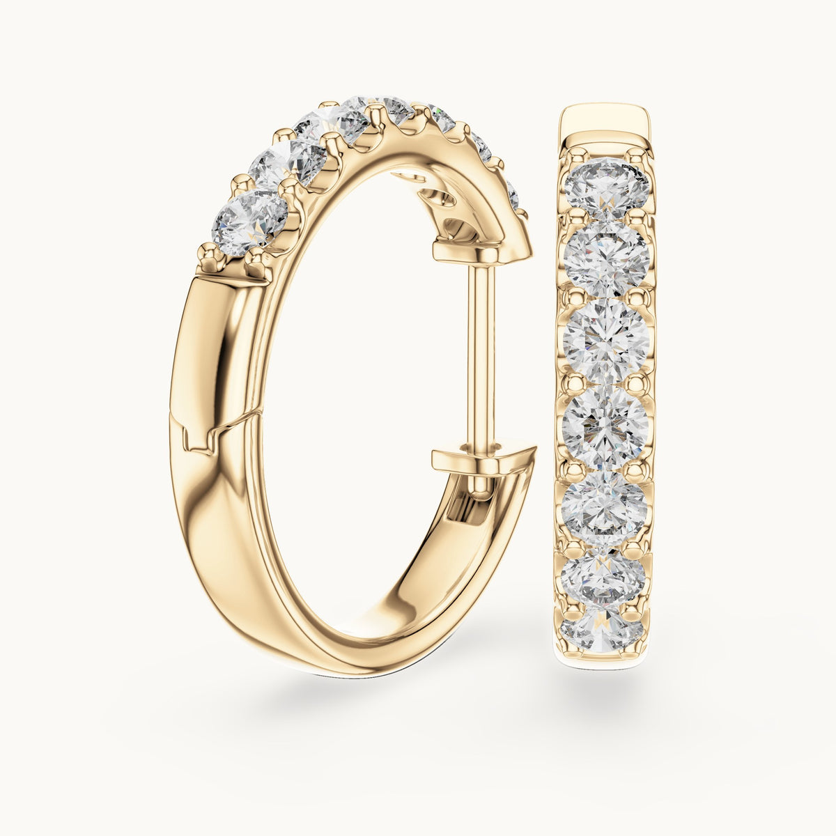 Round lab-grown diamond graduated hoop earrings in yellow gold, 0.70 CT TW, view 1