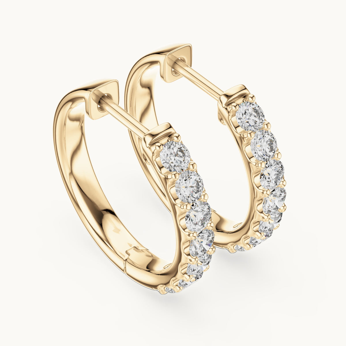 Round lab-grown diamond graduated hoop earrings in yellow gold, 0.70 CT TW, view 2