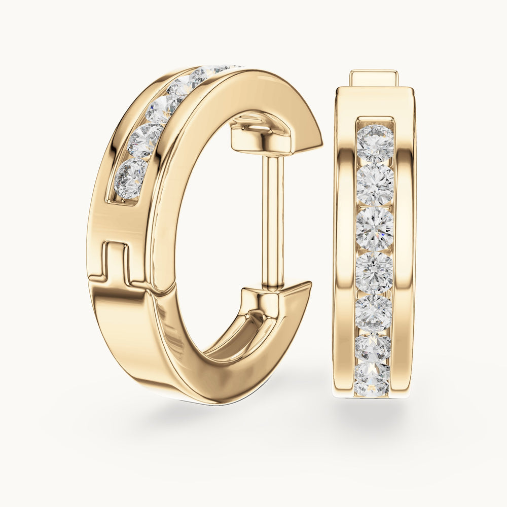 Round lab-grown diamond channel-set huggie hoop earrings in yellow gold, 0.144 CT TW, view 1