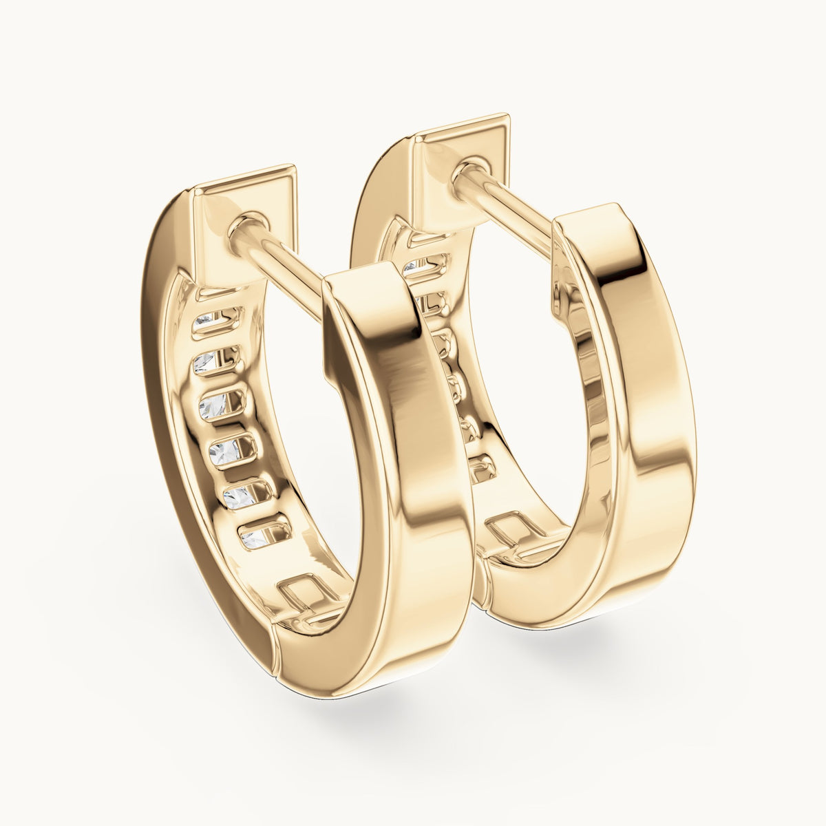 Round lab-grown diamond channel-set huggie hoop earrings in yellow gold, 0.144 CT TW, view 3