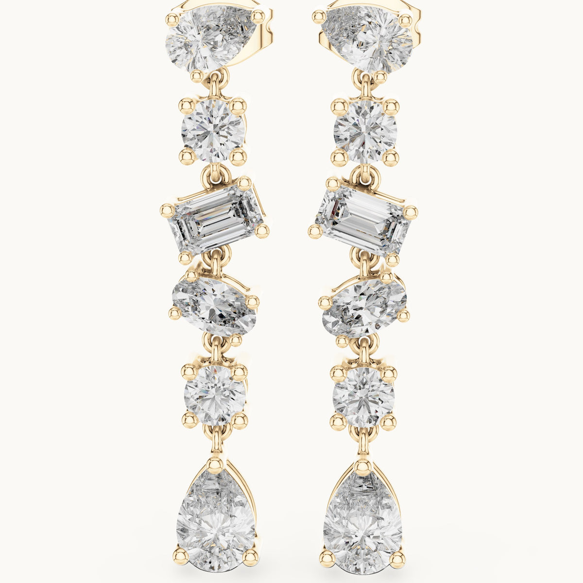 Pear, round and emerald-cut lab-grown diamond mixed-cut cascade drop earrings in yellow gold, 2.88 CT TW, view 1
