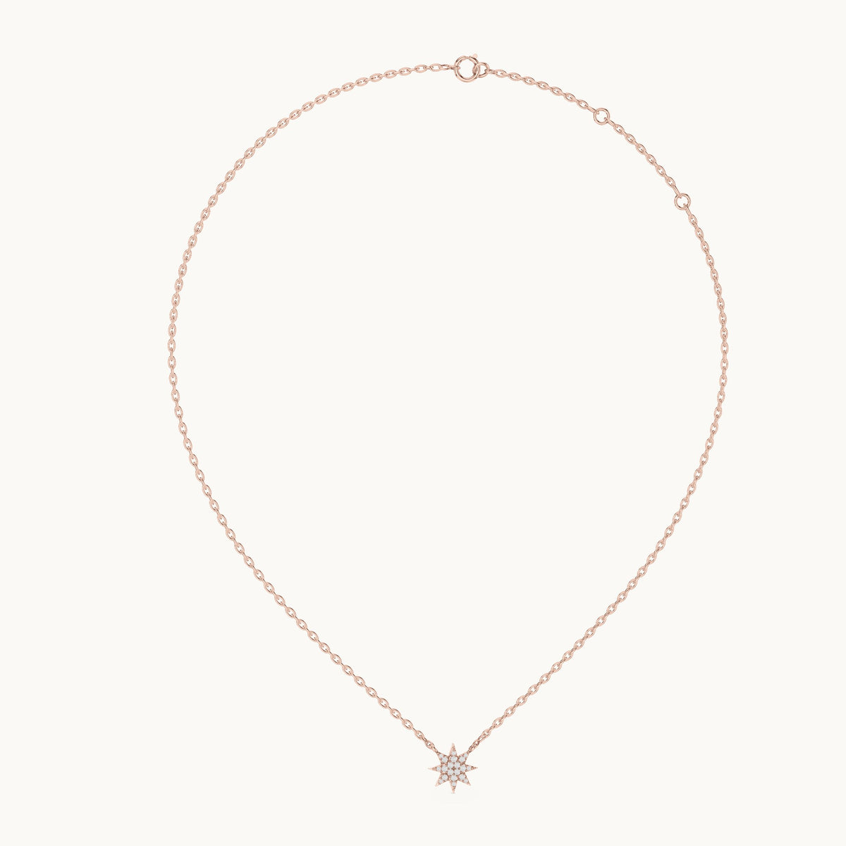Round lab-grown diamond starburst station pendant in rose gold, 0.17 CT TW, view 1