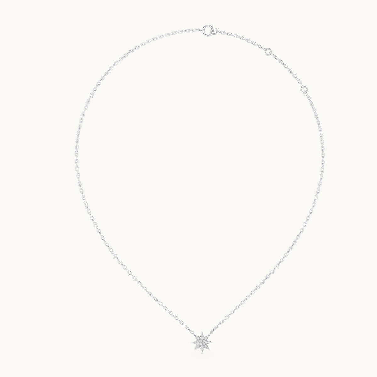 Round lab-grown diamond starburst station pendant in white gold, 0.17 CT TW, view 1