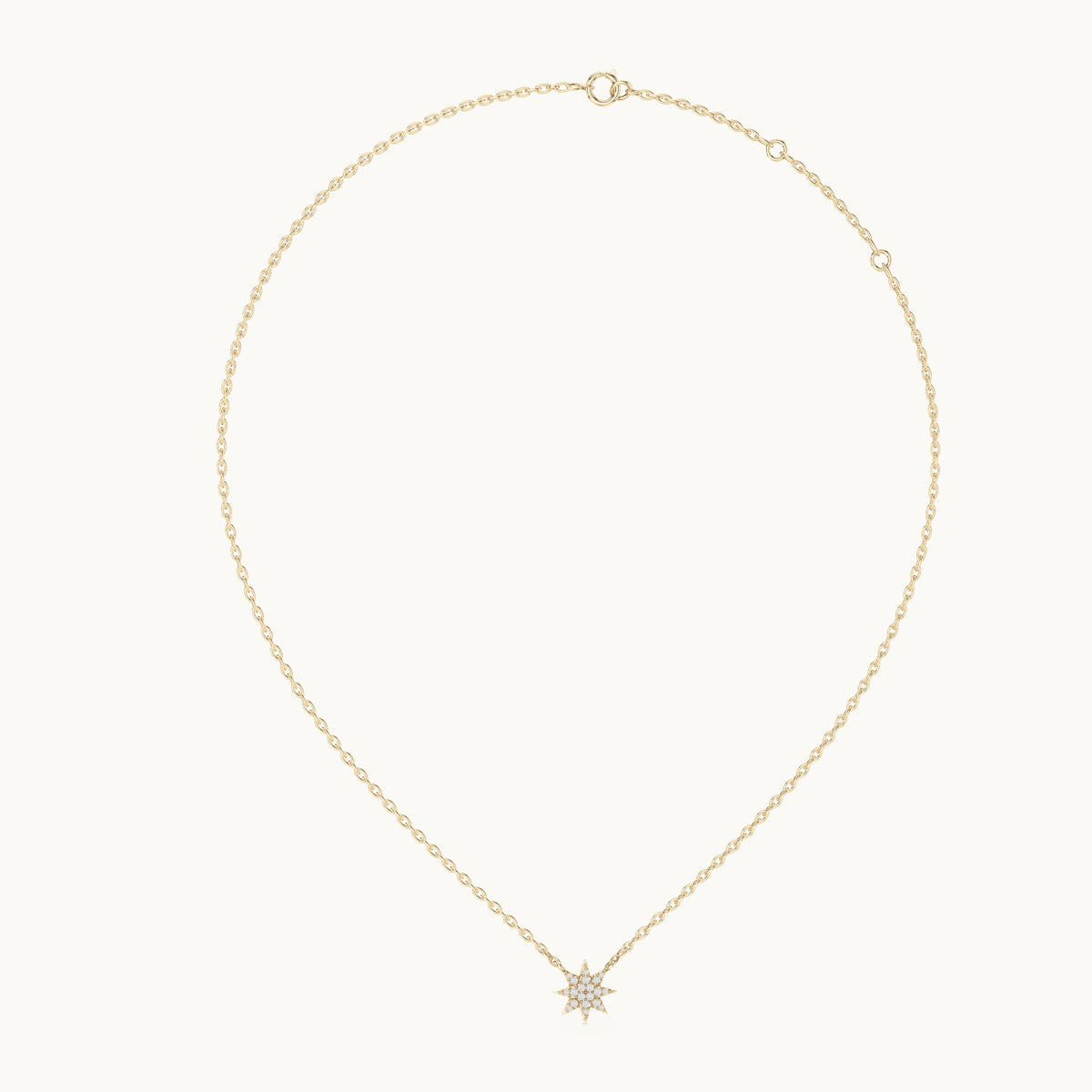 Round lab-grown diamond starburst station pendant in yellow gold, 0.17 CT TW, view 1