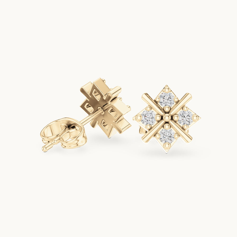 Round lab-grown diamond crossed bar star stud earrings in yellow gold, 0.28 CT TW, view 1