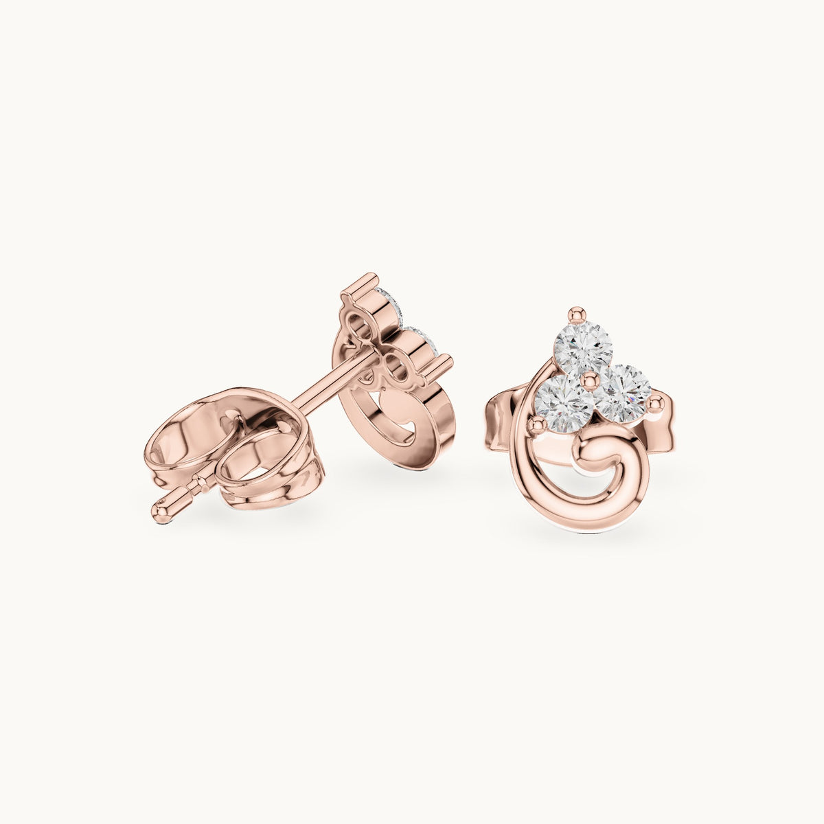 Round lab-grown diamond trio cluster swirl stud earrings in rose gold, 0.15 CT TW, view 1
