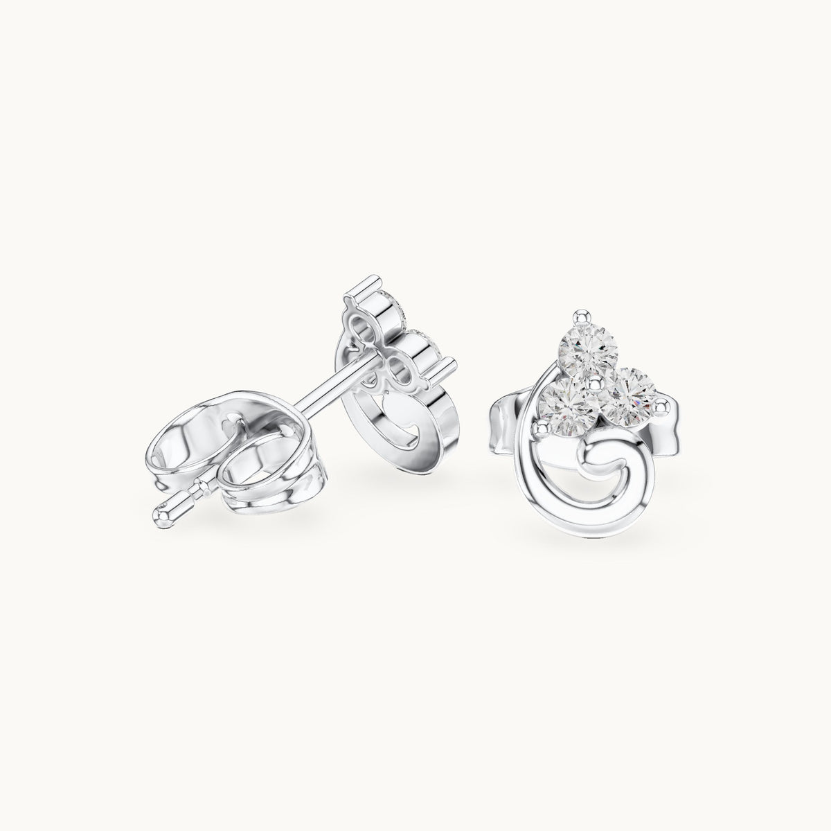 Round lab-grown diamond trio cluster swirl stud earrings in white gold, 0.15 CT TW, view 1