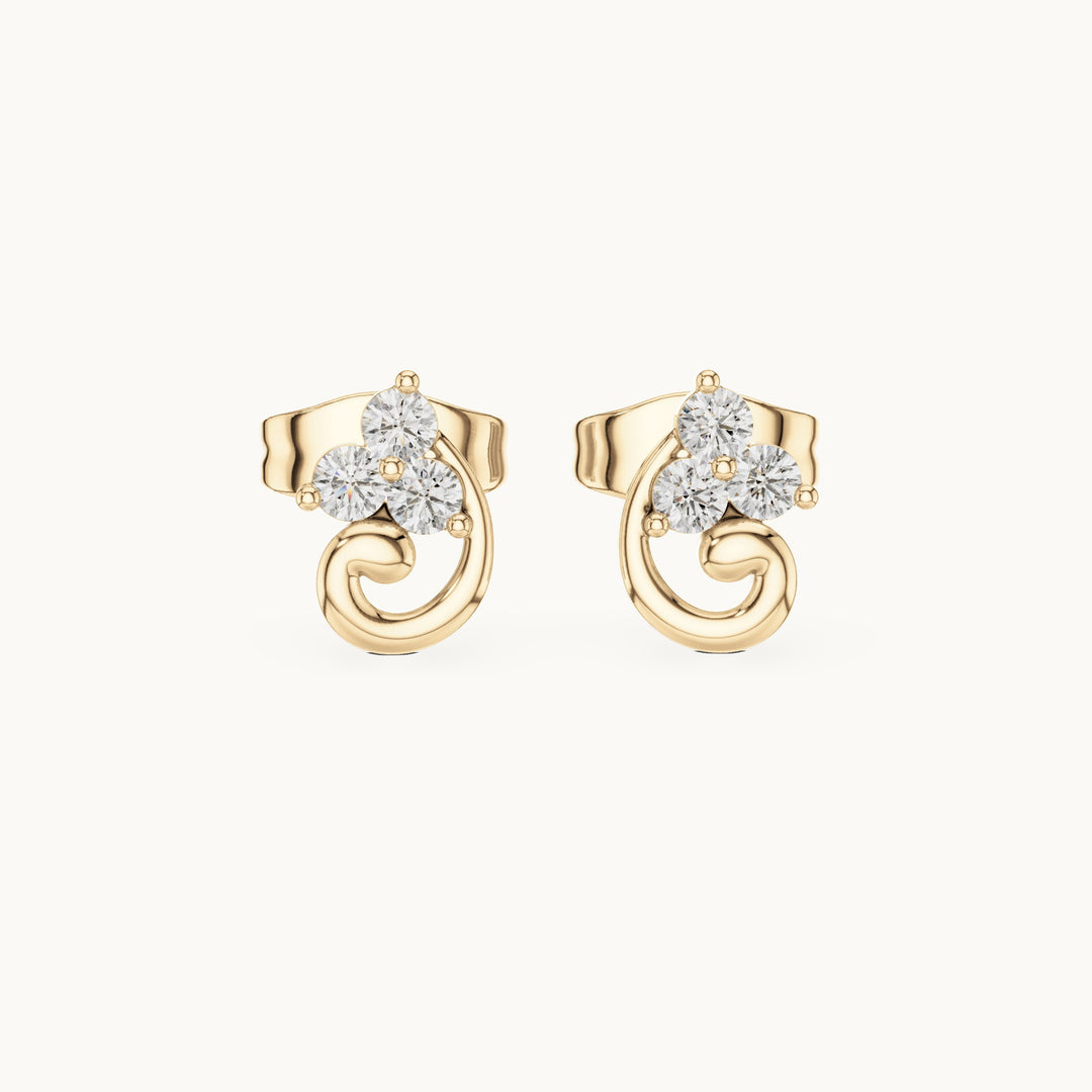 Round lab-grown diamond trio cluster swirl stud earrings in yellow gold, 0.15 CT TW, view 4