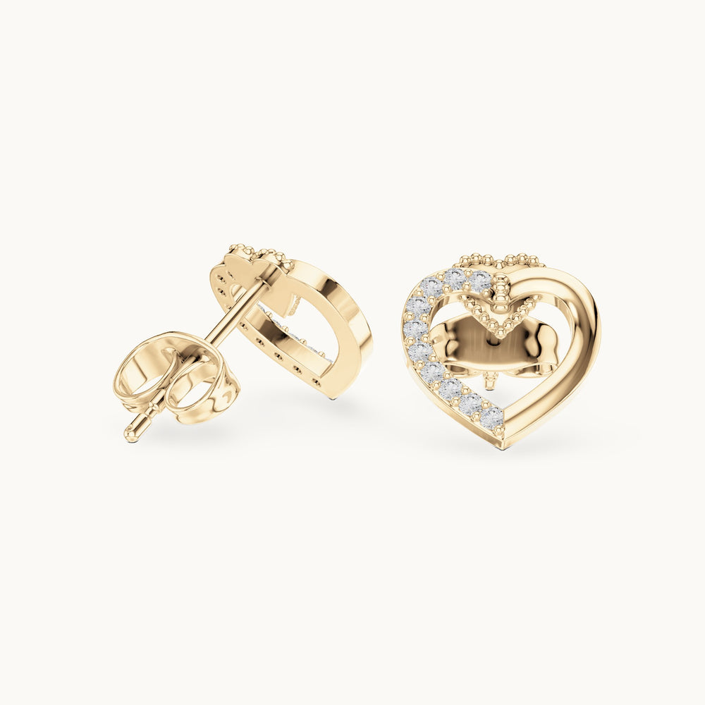 Round lab-grown diamond open heart stud earrings in yellow gold, 0.12 CT TW, view 1