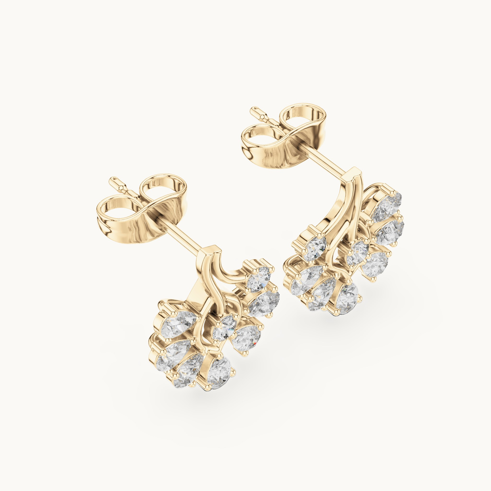 Pear and round lab-grown diamond flower cluster stud earrings in 14K yellow gold, 0.64 CT TW, view 2