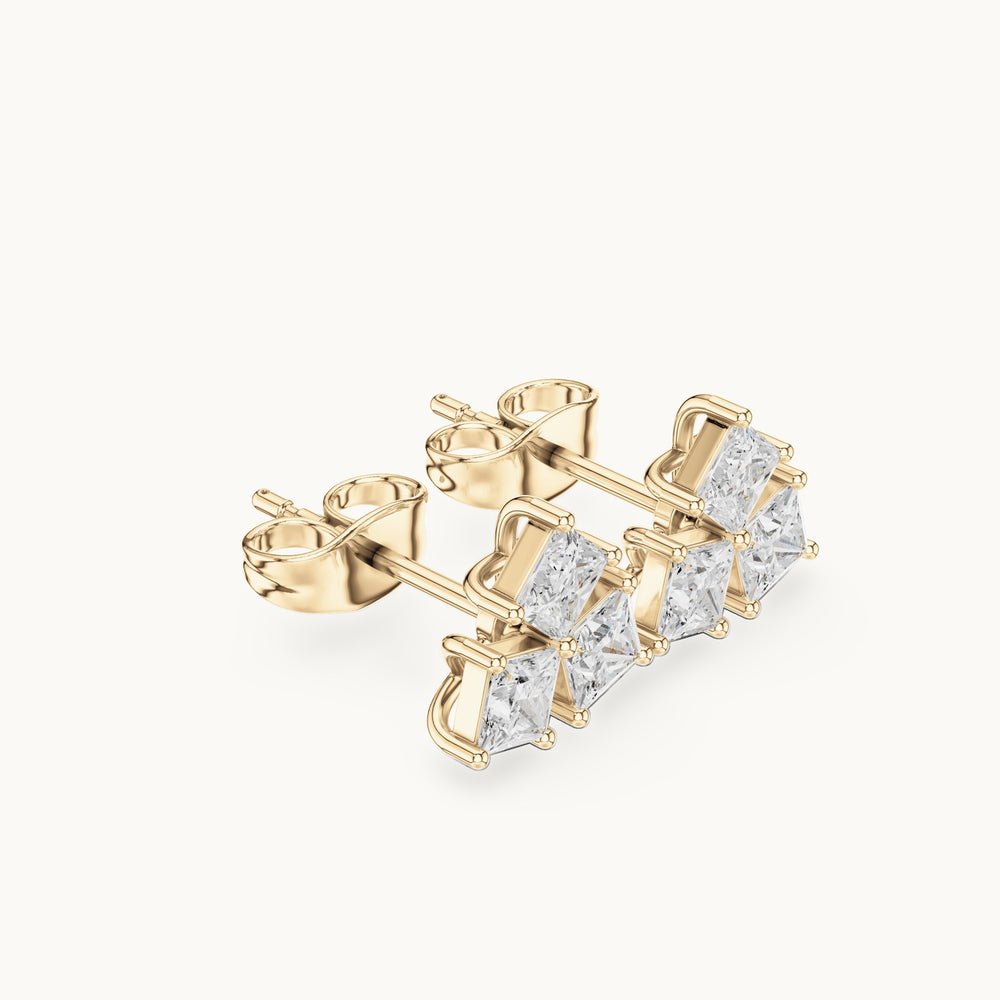 Princess-cut lab-grown diamond three-stone cluster stud earrings in yellow gold, 0.82 CT TW, view 1