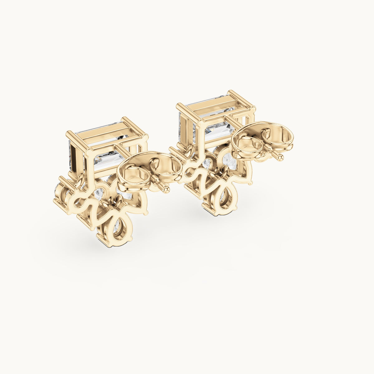 Emerald-cut, pear and round lab-grown diamond cluster stud earrings in yellow gold, 3.19 CT TW, view 3