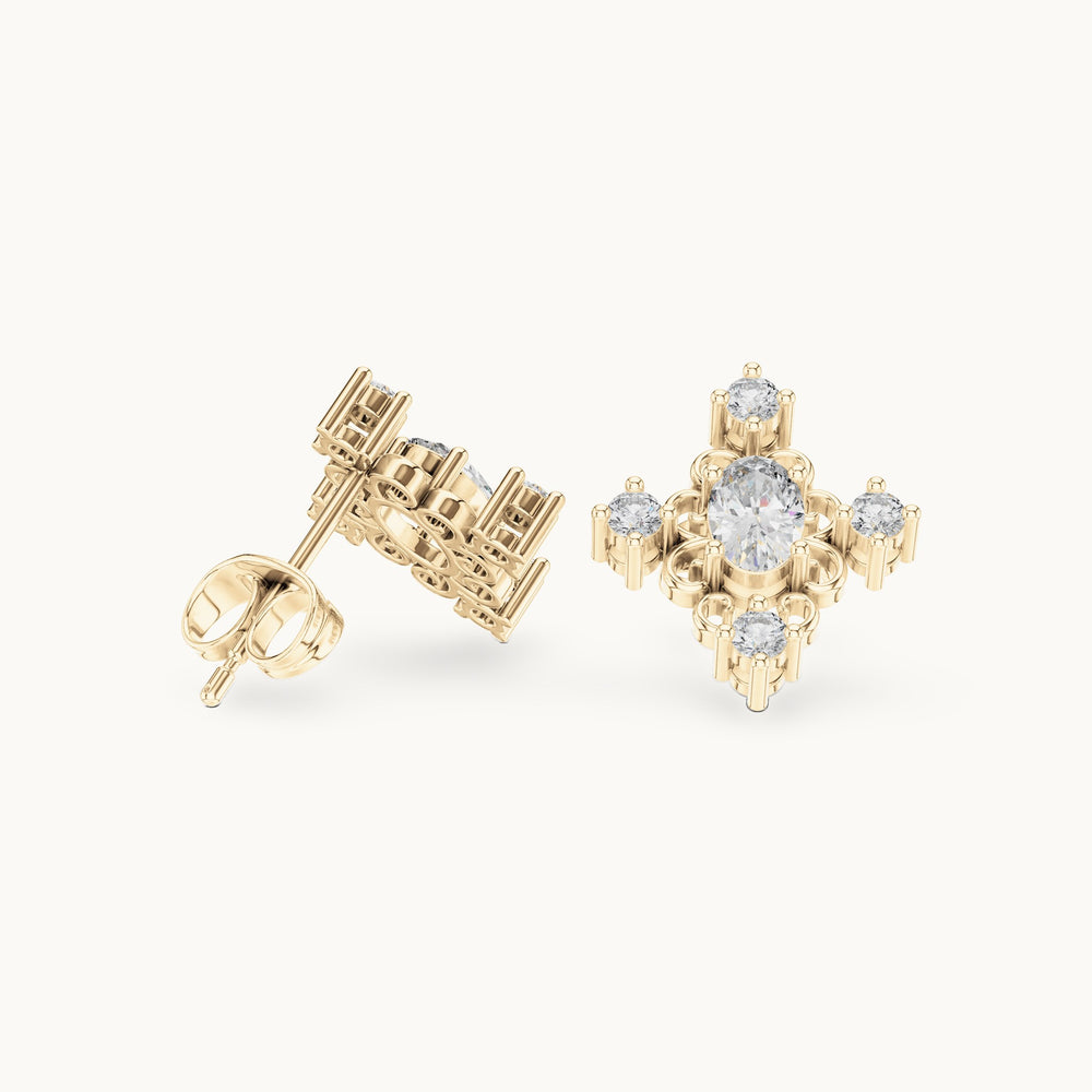 Oval and round lab-grown diamond cross cluster stud earrings in yellow gold, 0.73 CT TW, view 1