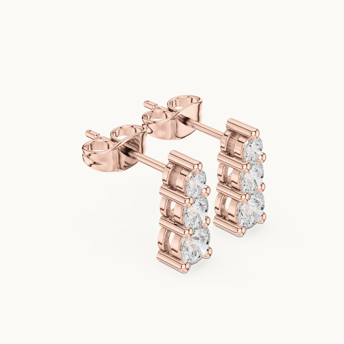 Round lab-grown diamond three stone drop earrings in 14K rose gold, 0.87 CT TW, view 1