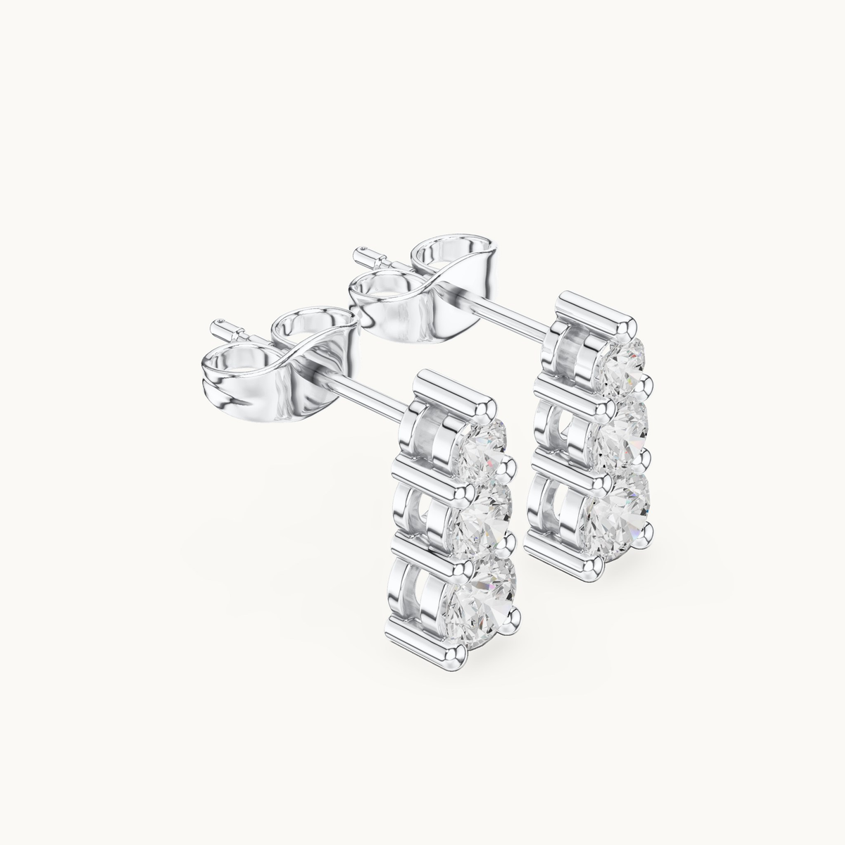 Round lab-grown diamond three stone drop earrings in 14K white gold, 0.87 CT TW, view 1