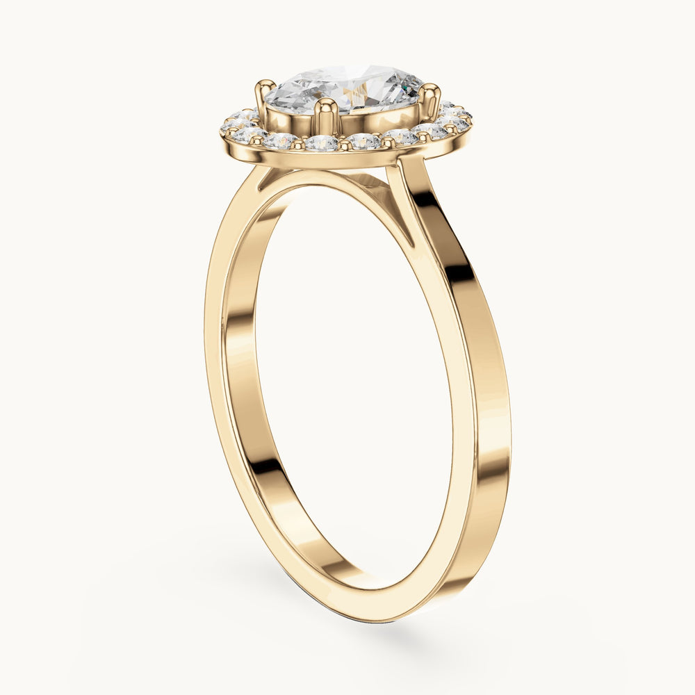Oval lab-grown diamond halo engagement ring in yellow gold, 0.94 CT TW, view 1