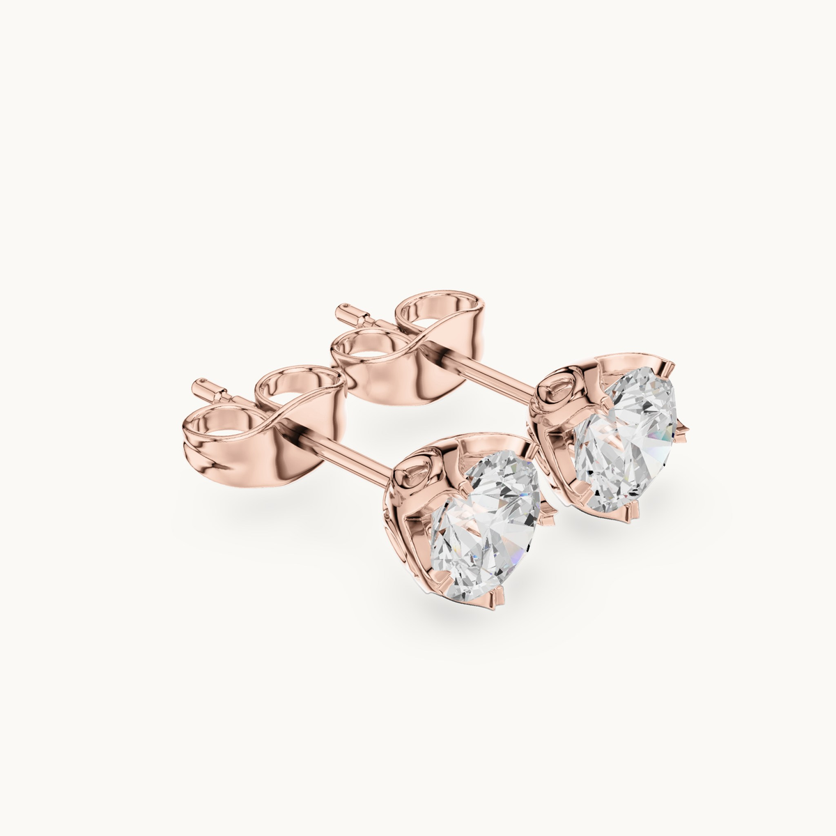 Round lab-grown diamond solitaire stud earrings in 14K rose gold, 1.00 CT TW, view 1