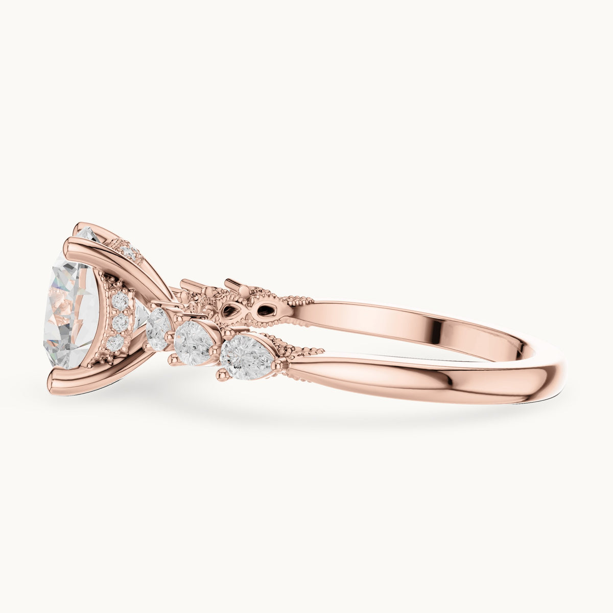 Round and pear lab-grown diamond engagement ring with pear side stones in rose gold, 2.318 CT TW, view 3