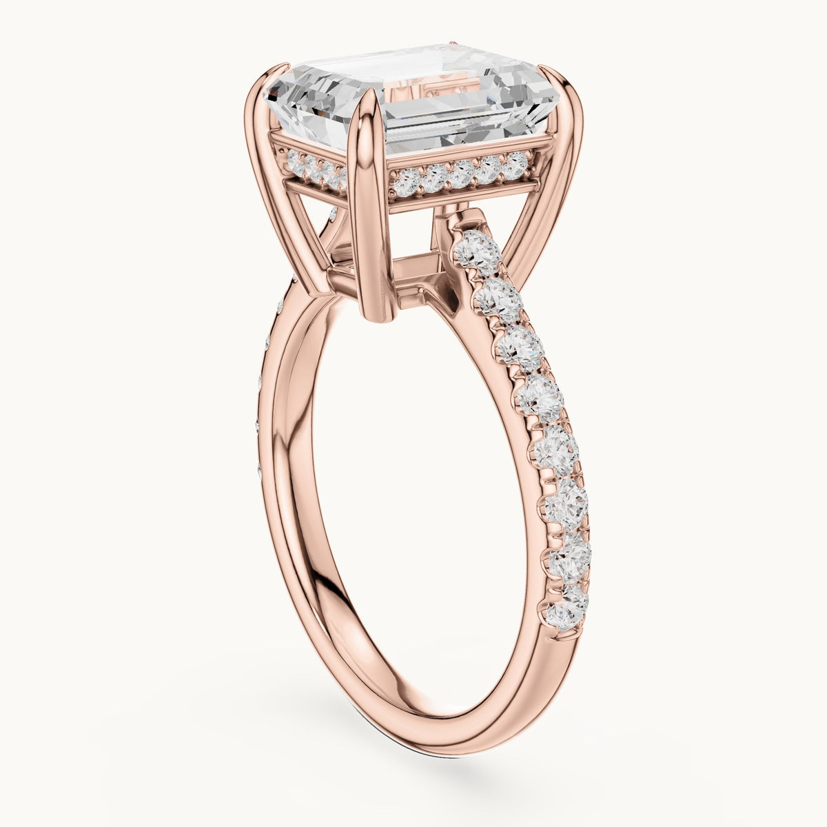 Emerald-cut and round lab-grown diamond hidden halo pavé engagement ring in rose gold, 4.588 CT TW, view 1