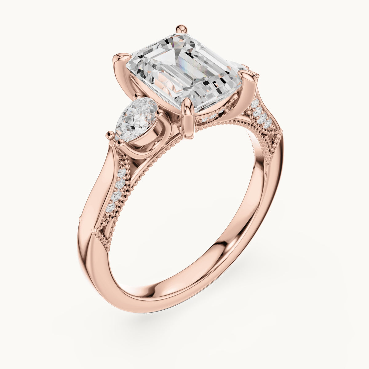 Emerald-cut, pear and round lab-grown diamond three-stone engagement ring with pear side stones in rose gold, 2.475 CT TW, view 2