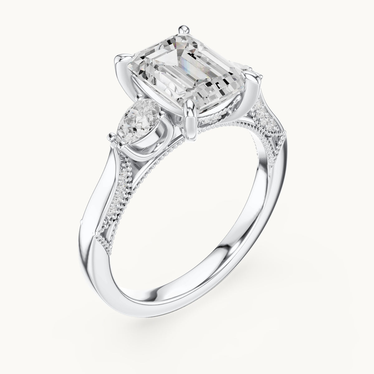 Emerald-cut, pear and round lab-grown diamond three-stone engagement ring with pear side stones in white gold, 2.475 CT TW, view 2