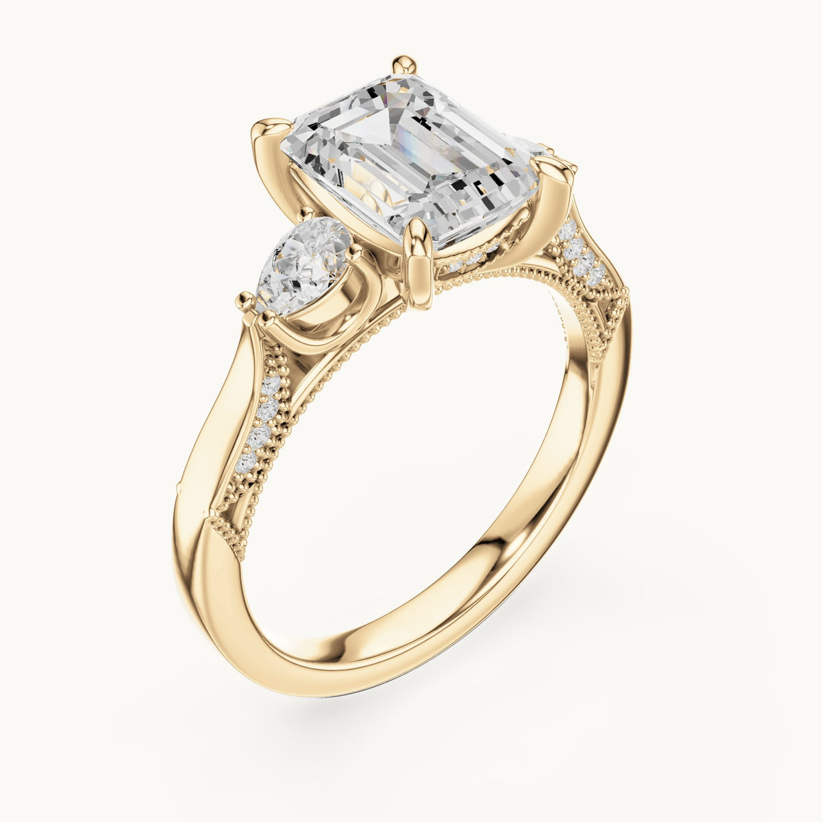 Emerald-cut, pear and round lab-grown diamond three-stone engagement ring with pear side stones in yellow gold, 2.475 CT TW, view 2