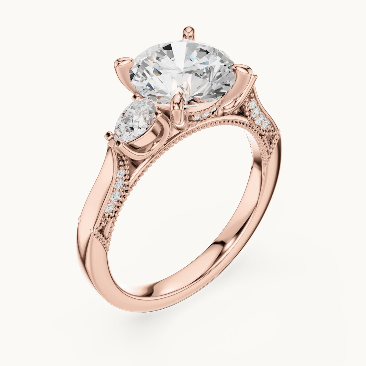 Round and pear lab-grown diamond three-stone engagement ring with pear side stones in rose gold, 2.375 CT TW, view 2
