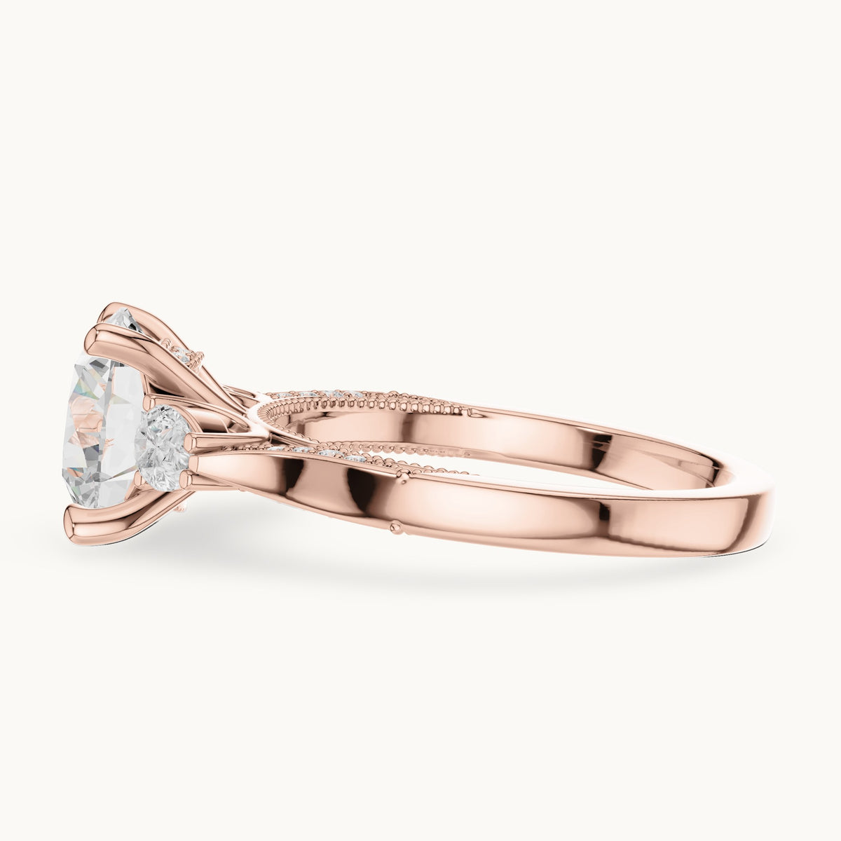 Round and pear lab-grown diamond three-stone engagement ring with pear side stones in rose gold, 2.375 CT TW, view 3