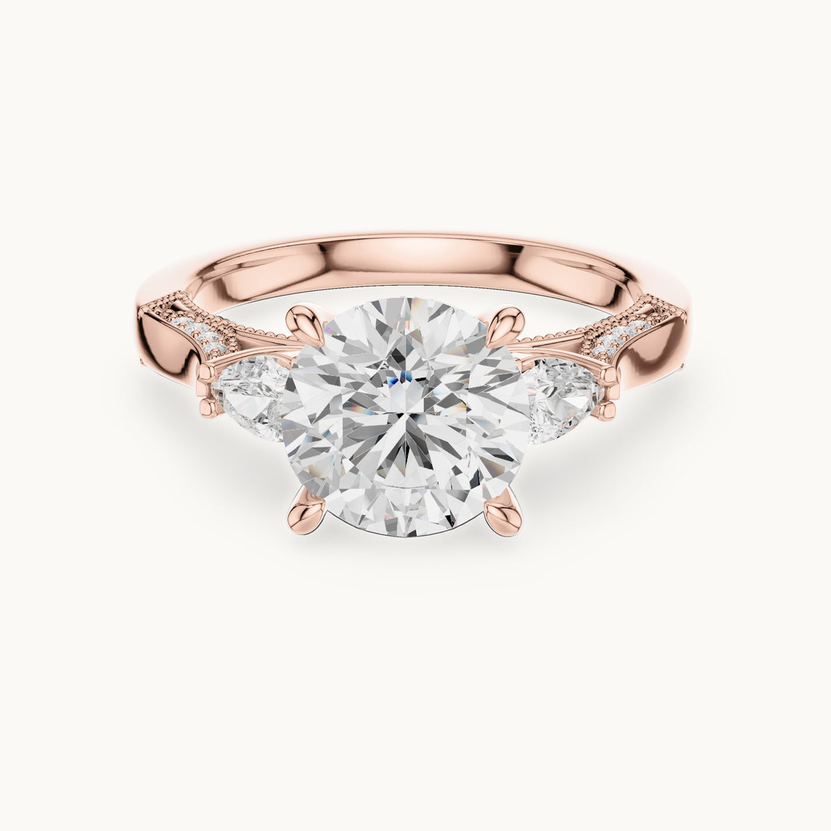 Round and pear lab-grown diamond three-stone engagement ring with pear side stones in rose gold, 2.375 CT TW, view 4