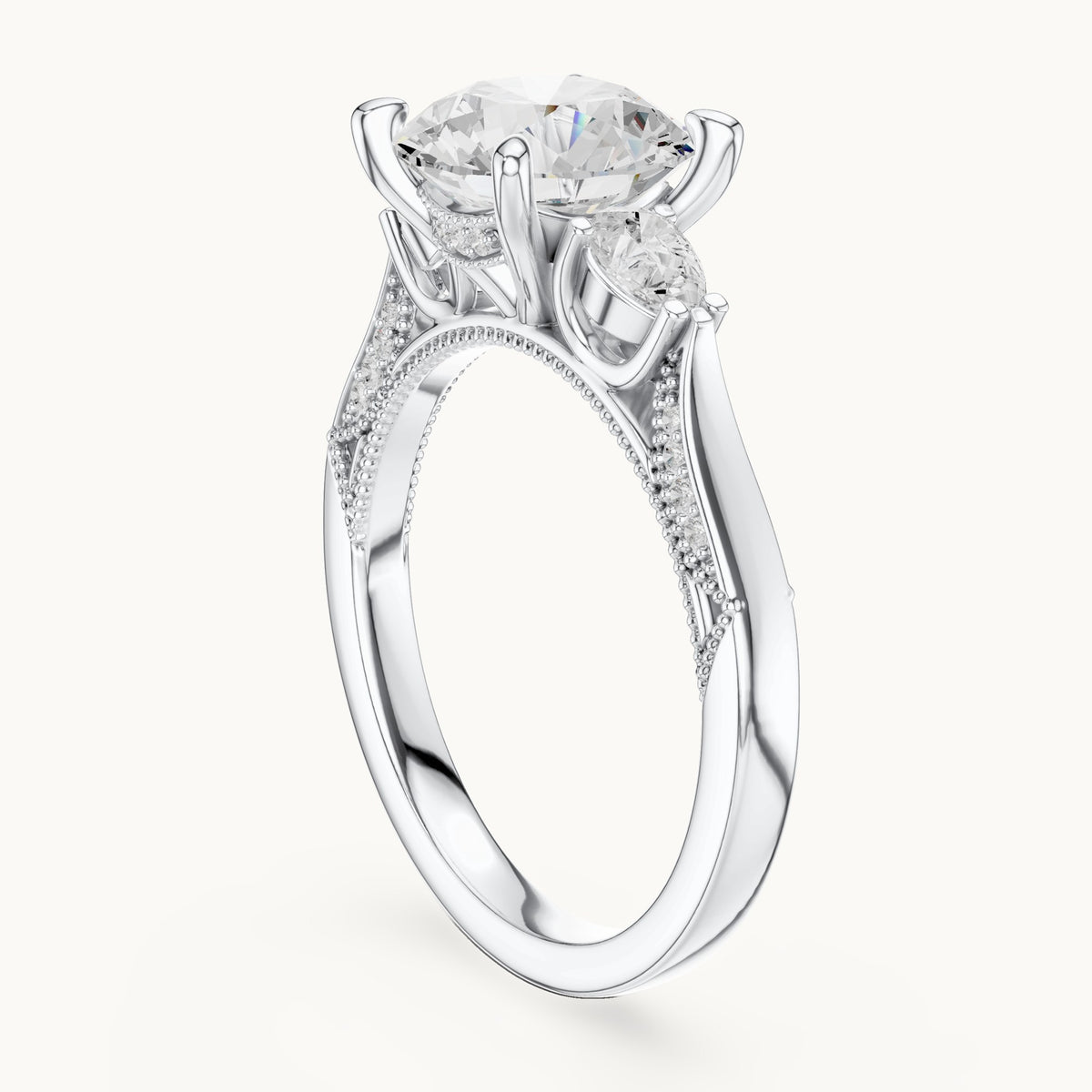 Round and pear lab-grown diamond three-stone engagement ring with pear side stones in white gold, 2.375 CT TW, view 1