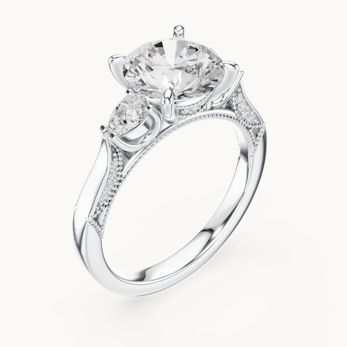 Round and pear lab-grown diamond three-stone engagement ring with pear side stones in white gold, 2.375 CT TW, view 2