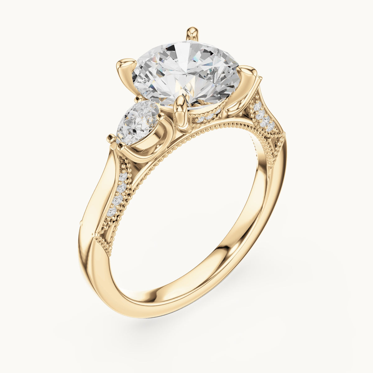 Round and pear lab-grown diamond three-stone engagement ring with pear side stones in yellow gold, 2.375 CT TW, view 2