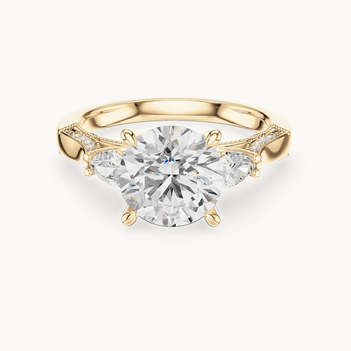 Round and pear lab-grown diamond three-stone engagement ring with pear side stones in yellow gold, 2.375 CT TW, view 4
