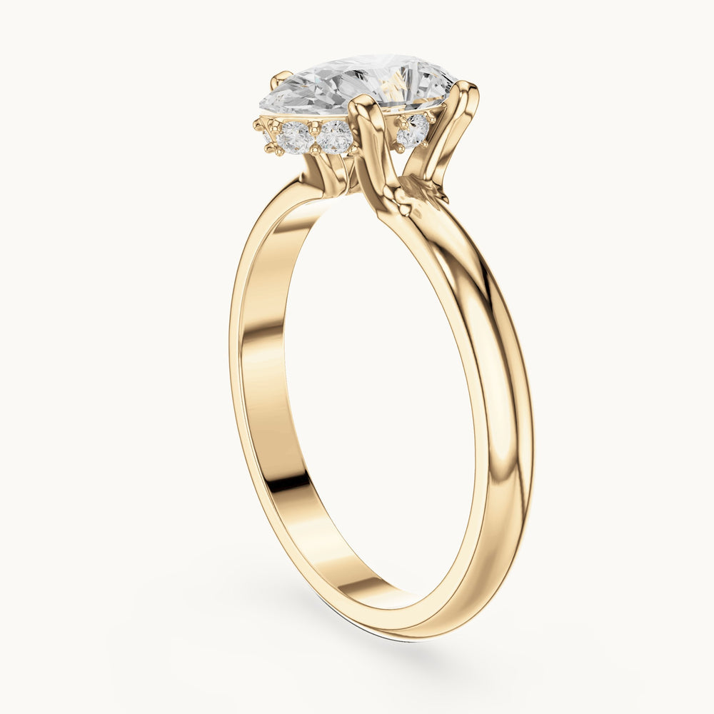 Pear and round lab-grown diamond hidden halo solitaire engagement ring in yellow gold, 1.108 CT TW, view 1