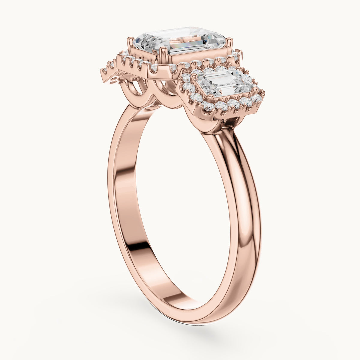 Emerald-cut and round lab-grown diamond three-stone halo engagement ring with emerald-cut side stones in rose gold, 1.468 CT TW, view 1