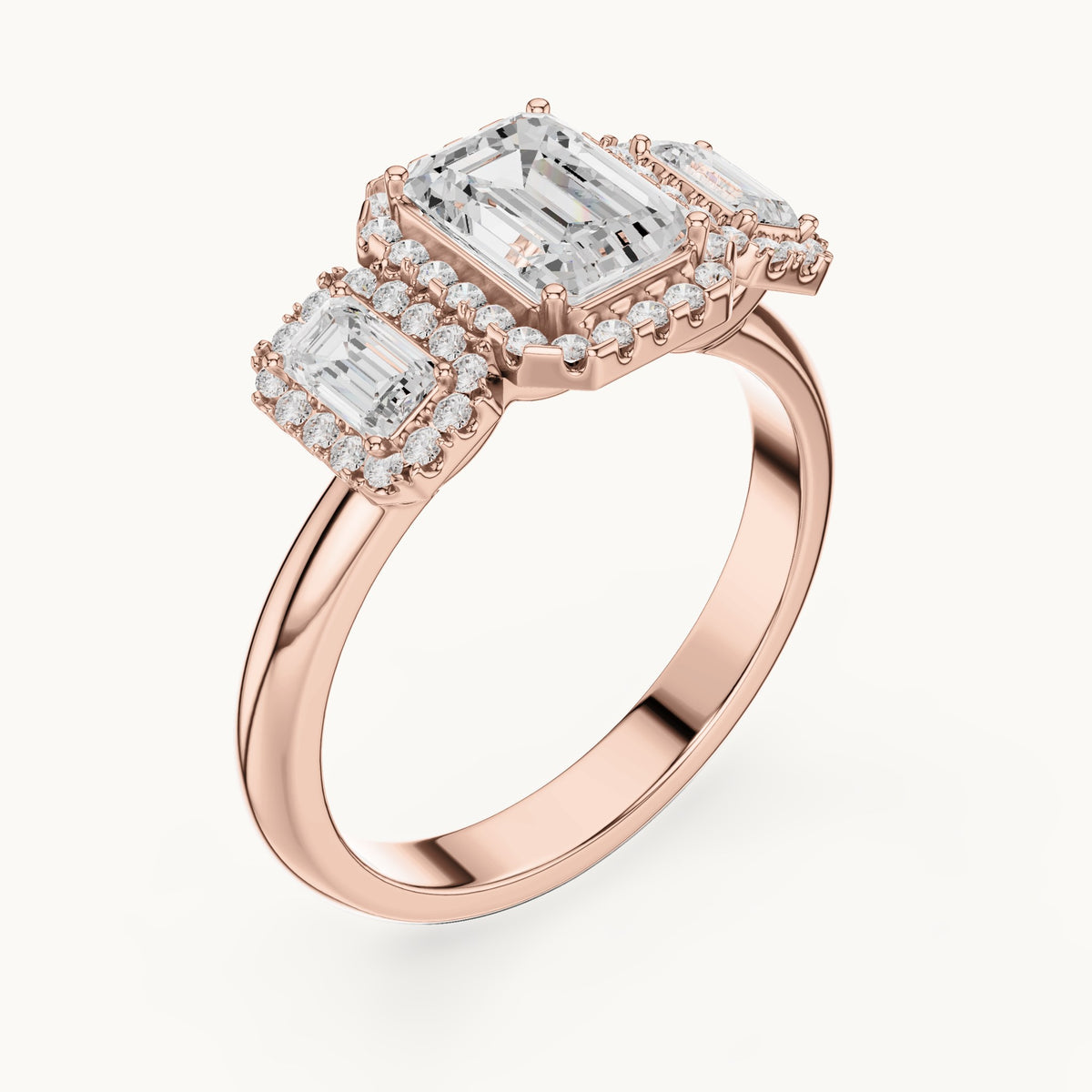 Emerald-cut and round lab-grown diamond three-stone halo engagement ring with emerald-cut side stones in rose gold, 1.468 CT TW, view 2