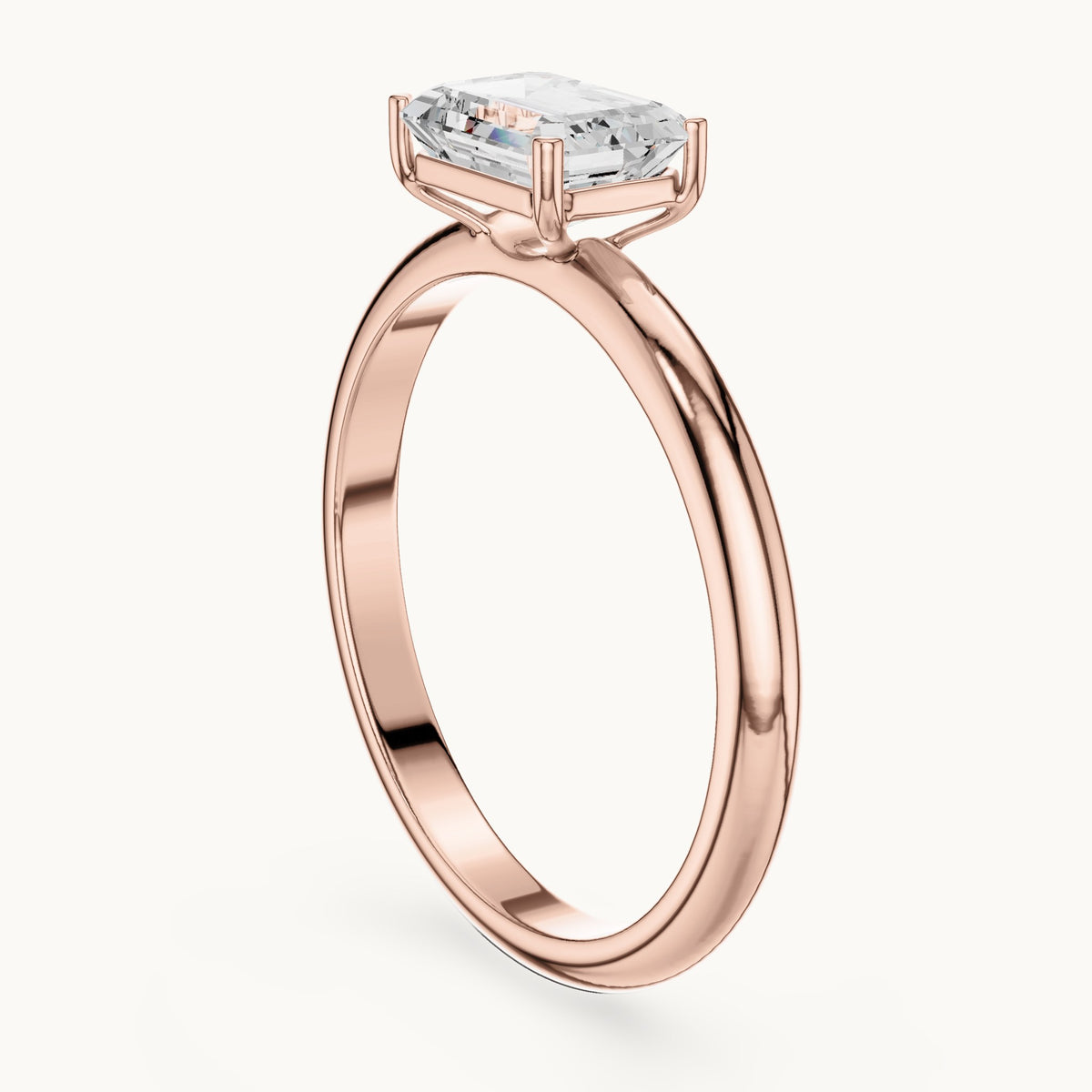 Emerald-cut lab-grown diamond east-west solitaire engagement ring in rose gold, 1.00 CT TW, view 1