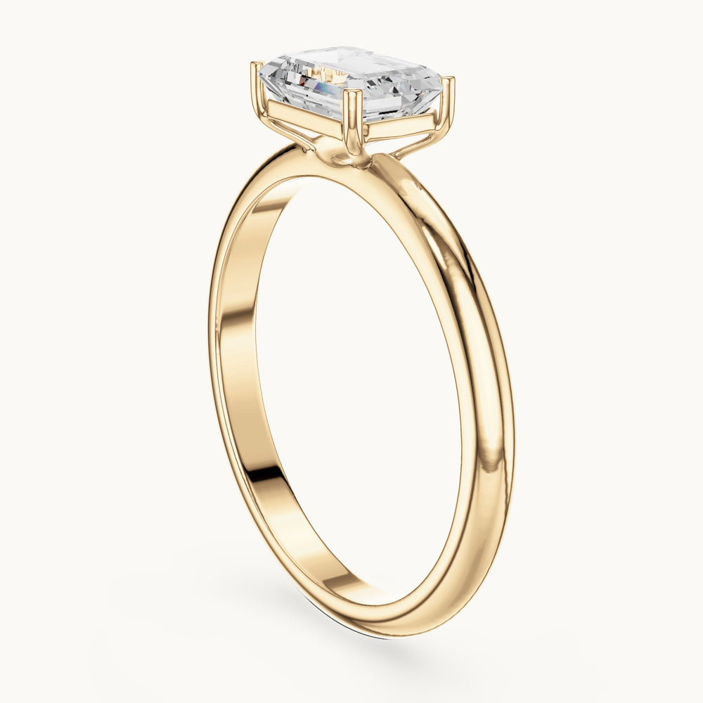 Emerald-cut lab-grown diamond east-west solitaire engagement ring in yellow gold, 1.00 CT TW, view 1