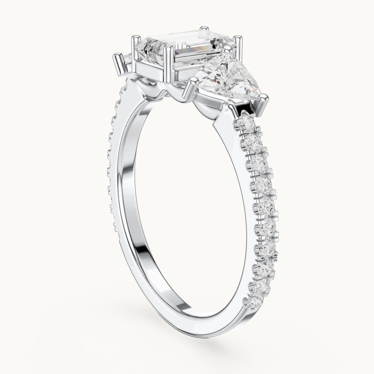 Emerald-cut, trillion and round lab-grown diamond three-stone engagement ring with trillion side stones in white gold, 1.85 CT TW, view 1